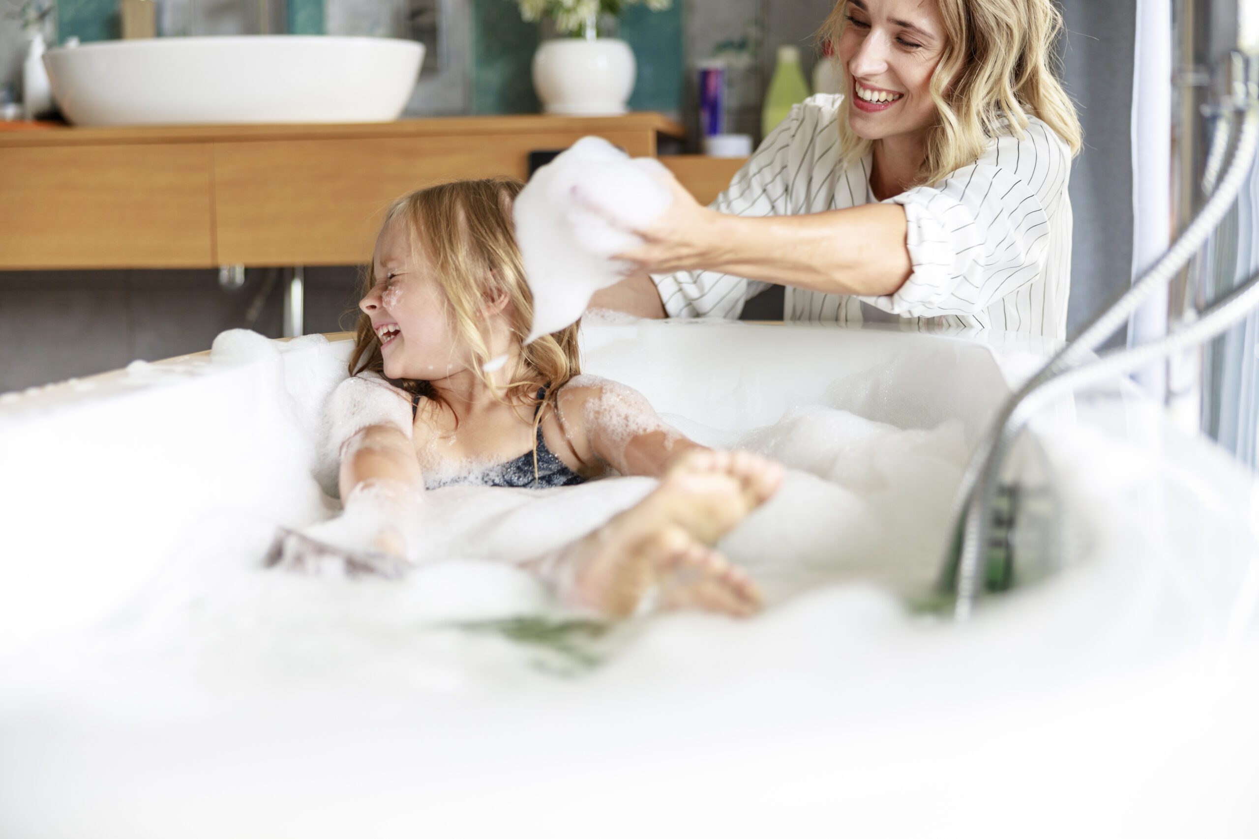 Happy mom holding foam in her hands